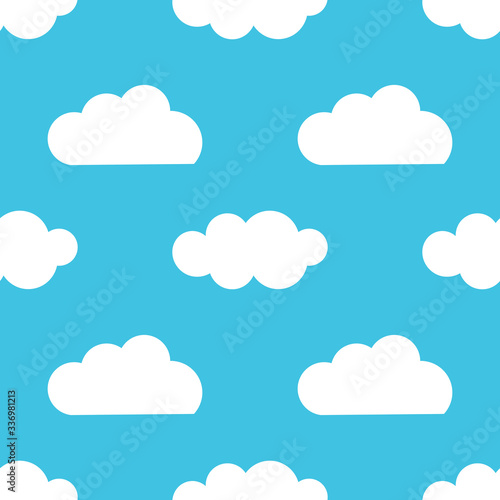 White clouds over blue sky seamless pattern.