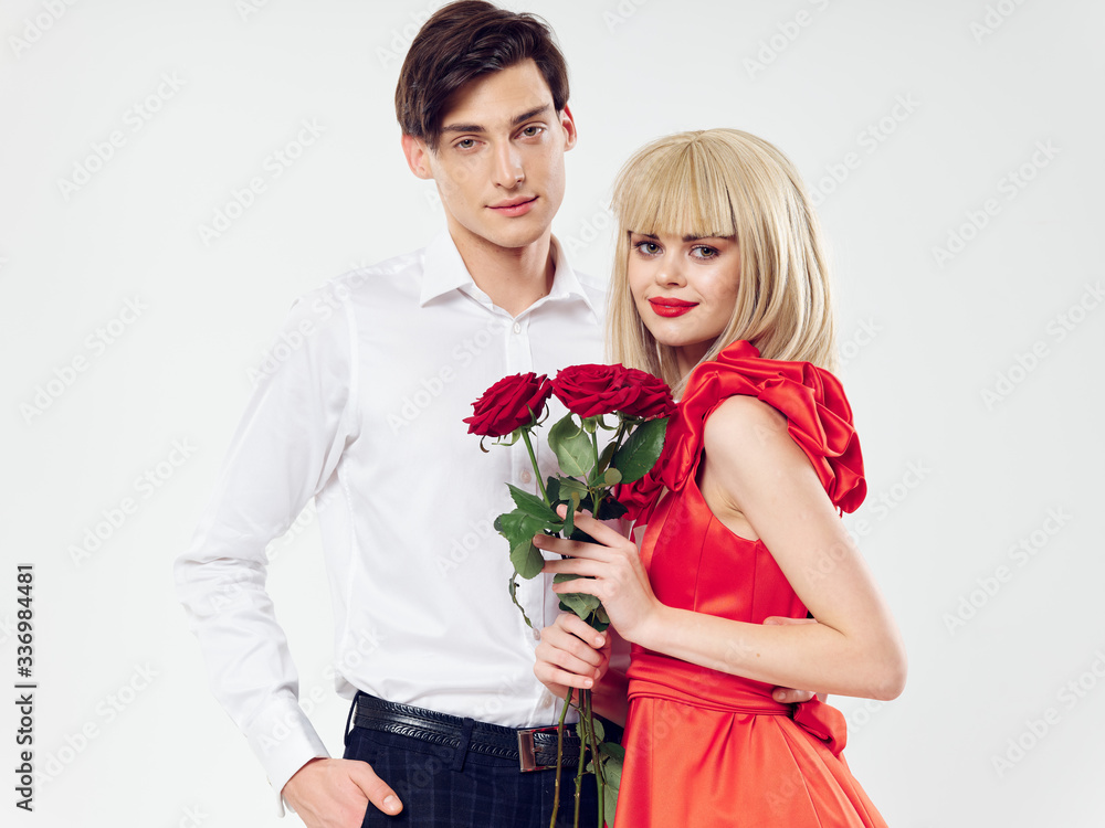 Cute young couple hugs family romance flowers Cute young couple hugs family romance flowers