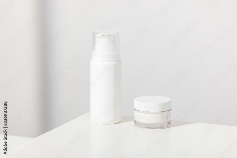 Empty cosmetics on a clean white background mockup Empty cosmetics on a clean white background mockup