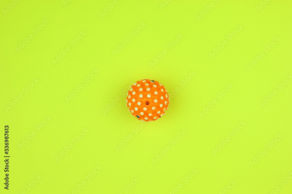 virus covid-19 ball on a yellow background virus covid-19 ball on a yellow background