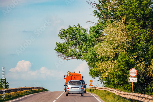 Wallpaper Mural cars go into the distance in the countryside Torontodigital.ca