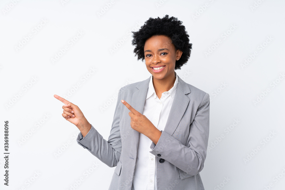 African american business woman over isolated white background pointing finger to the side African american business woman over isolated white background pointing finger to the side