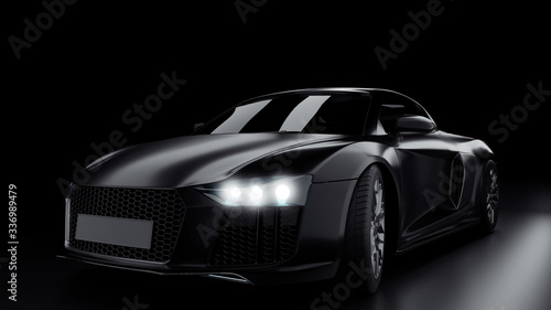 The car in the shadows with glowing lights in low light  or silhouette of sport car dark background. Selective focus