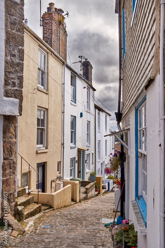 View of a narrow street in the coastal village of St Ives, Cornwall, UK