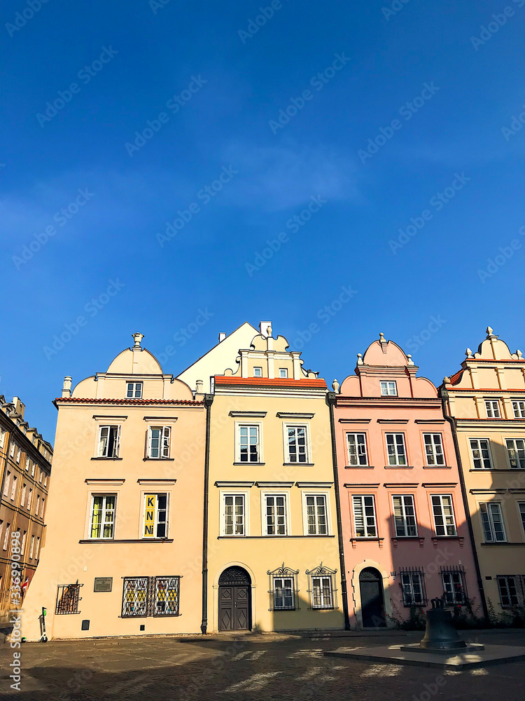 Warsaw, Poland - 21/ 06/ 2019:. Beautiful multi-colored houses in the old town in Warsaw. The central streets of the historic center of Warsaw. The main tourist attraction of Warsaw. 