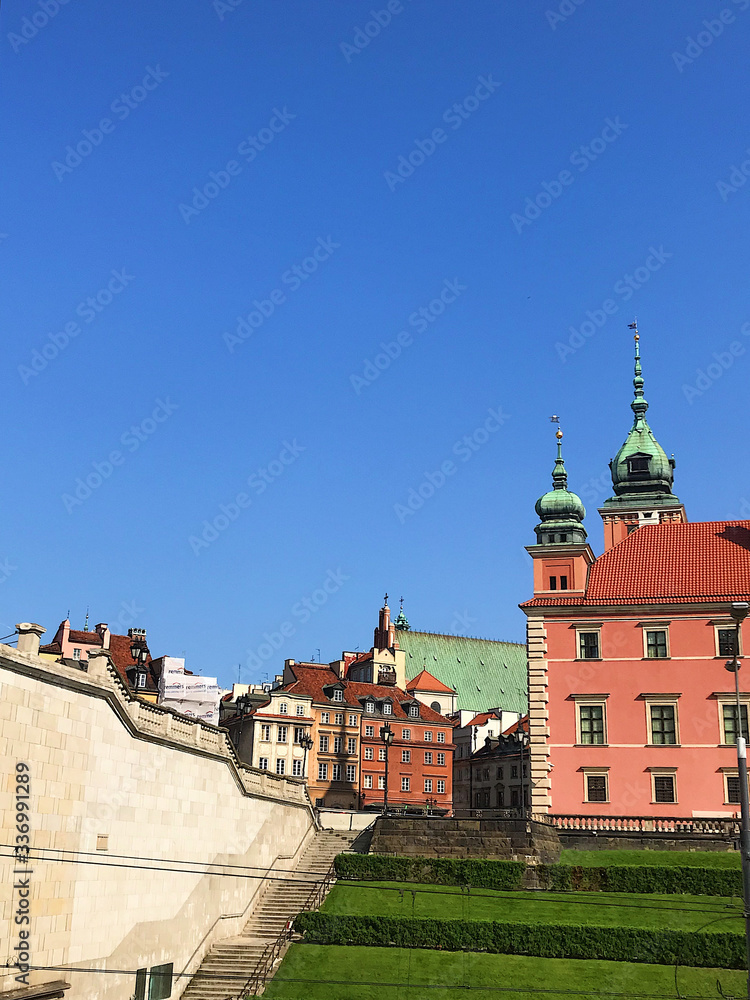 Warsaw, Poland - 21/ 06/ 2019:. Beautiful multi-colored houses in the old town in Warsaw. The central streets of the historic center of Warsaw. The main tourist attraction of Warsaw. 