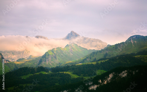 mountains in switzerland at sunset in summer