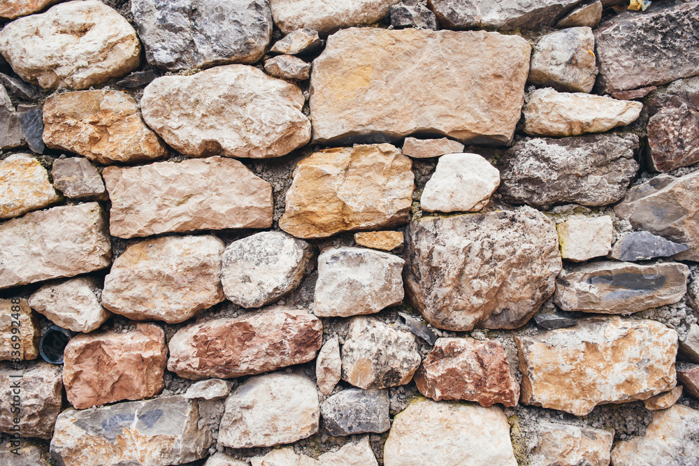 Wall of large natural stones. Wall of large natural stones.