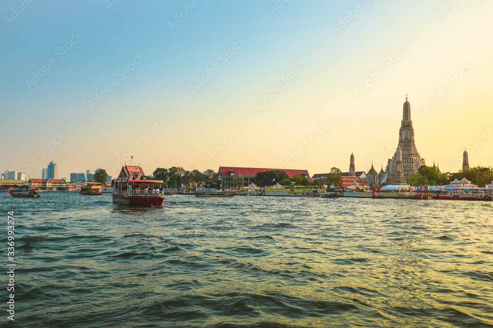 Wat Arun, Thai famous Buddhist temple, Beautiful ancient pagoda on river bank Chao Phraya in Bangkok, Thailand