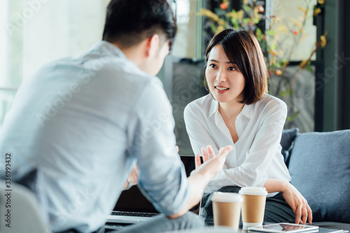 Young Asian business man and woman