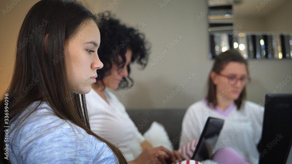 Parents and children all working from home in pajamas during corona covid 19 quarantine. Social distancing prevention from virus spread Parents and children all working from home in pajamas during corona covid 19 quarantine. Social distancing prevention from virus spread