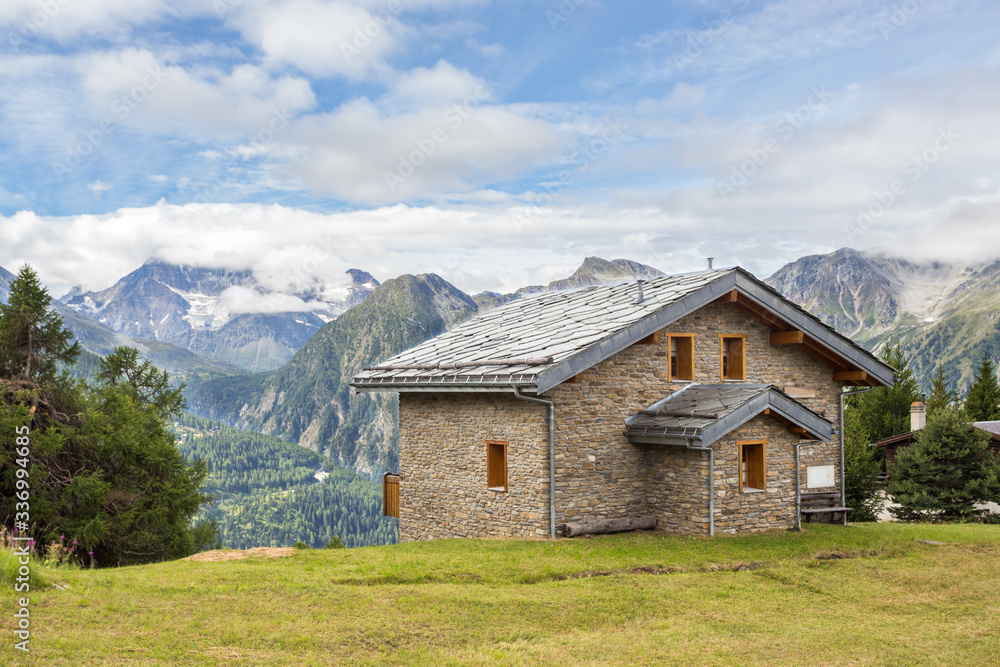 house in the mountains of switzerland, high mountain village