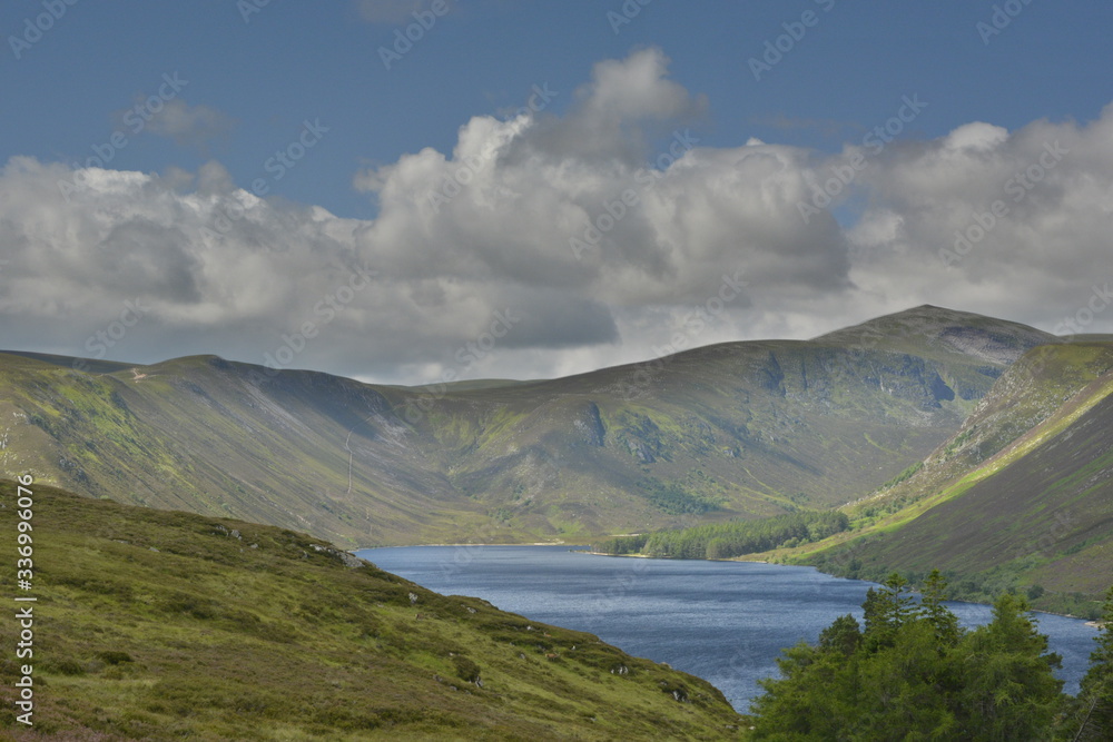 Fototapeta premium UK, Scotland, mountain landscape with lake and clouds, hdr