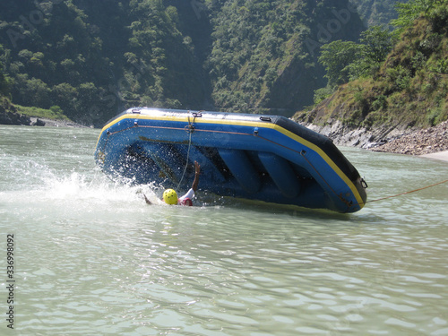 Bilde på lerret Capsized rafting boat, fun sport, kayaking