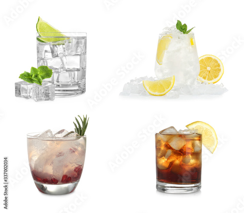 Set of different delicious cocktails with ice cubes on white background