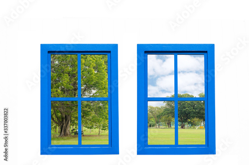 Vintage modern blue windows frame with space  garden view looking out from house.