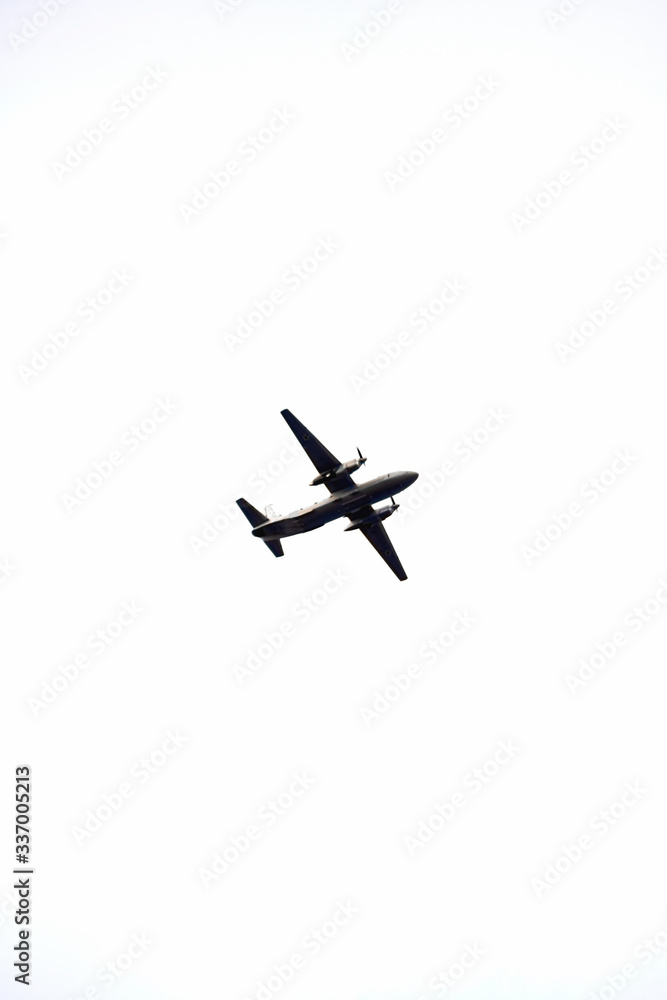 The plane is flying against the sky. Airlines and travel agencies The plane is flying against the sky. Airlines and travel agencies