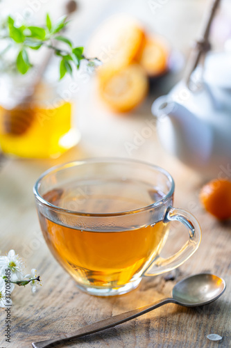 cup of green tea with lemon and honey to enhance immunity in the spring.