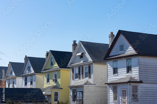 Row of Old Wood Homes in Elmhurst Queens © James