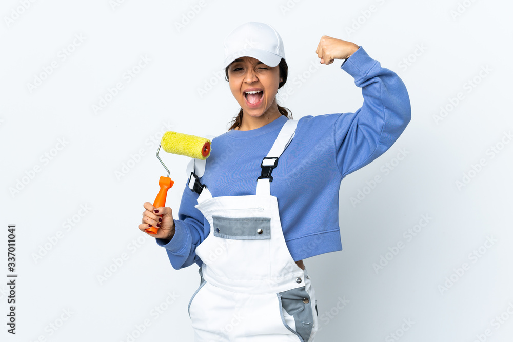 Painter woman over isolated white background doing strong gesture Painter woman over isolated white background doing strong gesture
