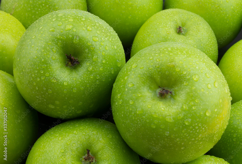 Fresh green apples with water drops Fresh green apples with water drops
