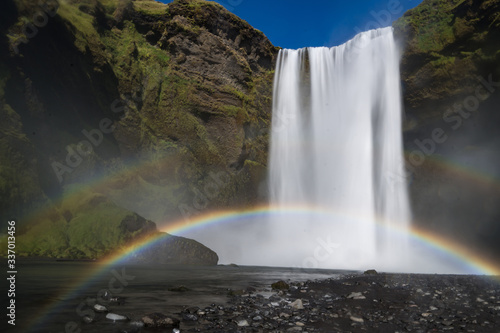 Fototapeta Naklejka Na Ścianę i Meble -  A rare double rainbow on the flying spray of Skogafoss waterfall in Iceland.