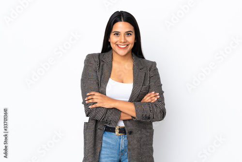 Cuadro en lienzo Young latin woman woman isolated on white background keeping the arms crossed in