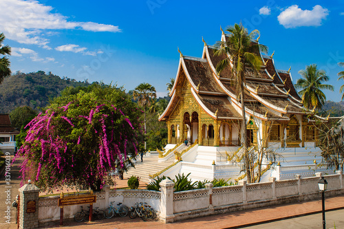 Temple in Luang Prabang with blue sky photo