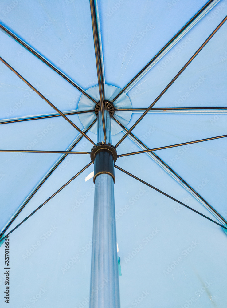 Metal frame in side the large umbrella. Metal frame in side the large umbrella.