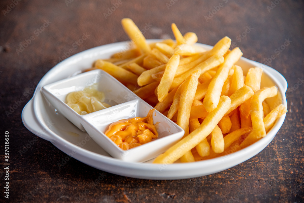 French Fries with Cheese Dip and Mayonnaise French Fries with Cheese Dip and Mayonnaise