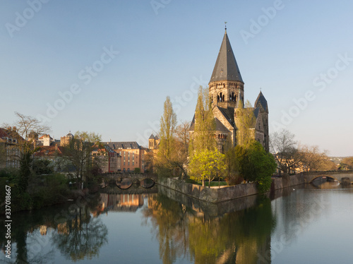 Temple with reflection in the Moselle river in Metz