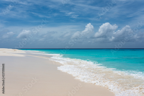Tropical white beach with crystalline water in Cayo de Agua (Los Roques Archipelago, Venezuela).