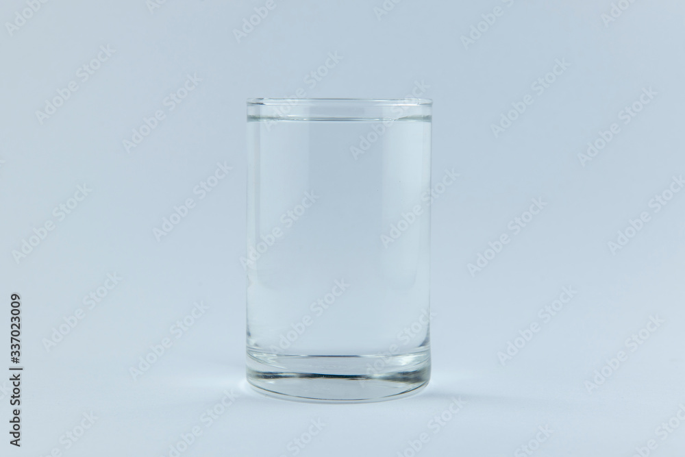 Drinking water in glass on white background as for food and drink concept. Drinking water in glass on white background as for food and drink concept.