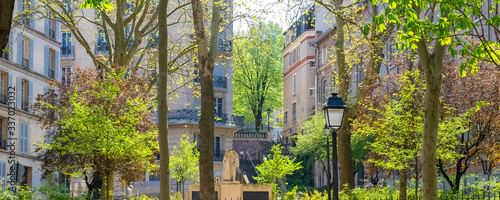 Photography Paris, Montmartre, typical street with a vintage lamppost, beautiful buildings a