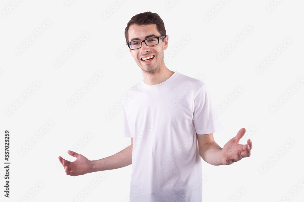 Happy man in glasses smiles broadly, arms outstretched. Opportunities concept Happy man in glasses smiles broadly, arms outstretched. Opportunities concept