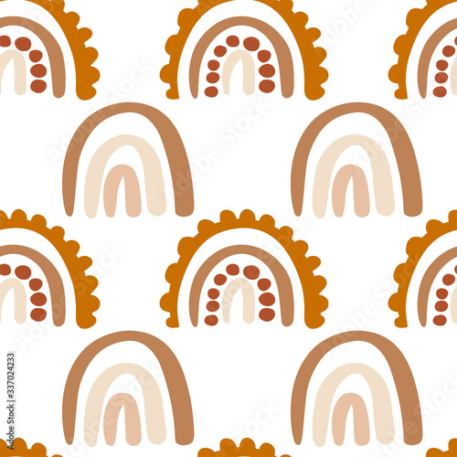 Seamless vector pattern with rainbows. Hand drawn illustration for kids. Pattern in cartoon style for poster, fabric, wallpaper, textile