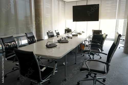 an empty meeting room at the office during Covid-19 situation everyone work from home, social distancing 
