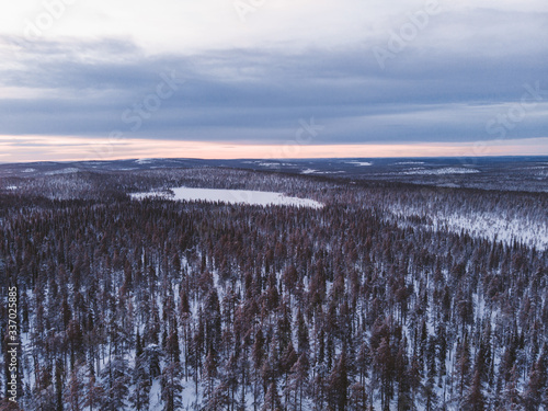 Charming winter sunset in Lapland