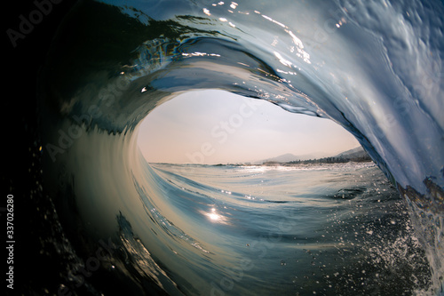Fototapeta Naklejka Na Ścianę i Meble -  view from inside a barrel of a glassy wave