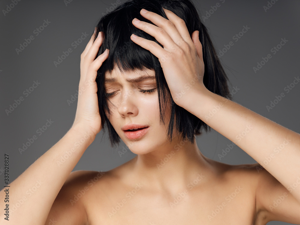 Fototapeta premium young woman with headache