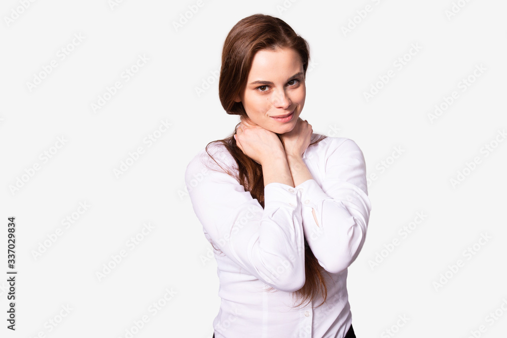 Cute lovely girl tenderly holding hands on neck. Isolated on white background Cute lovely girl tenderly holding hands on neck. Isolated on white background