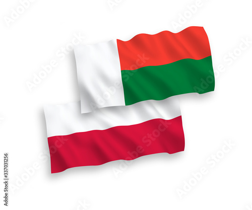 Flags of Madagascar and Poland on a white background