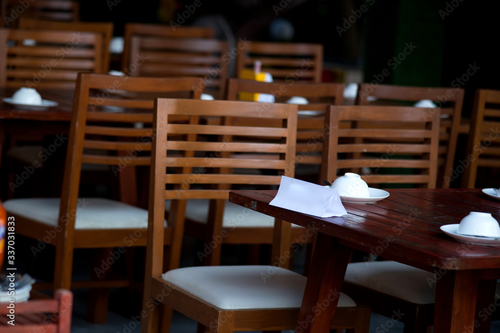 A wooden chair in a restaurant