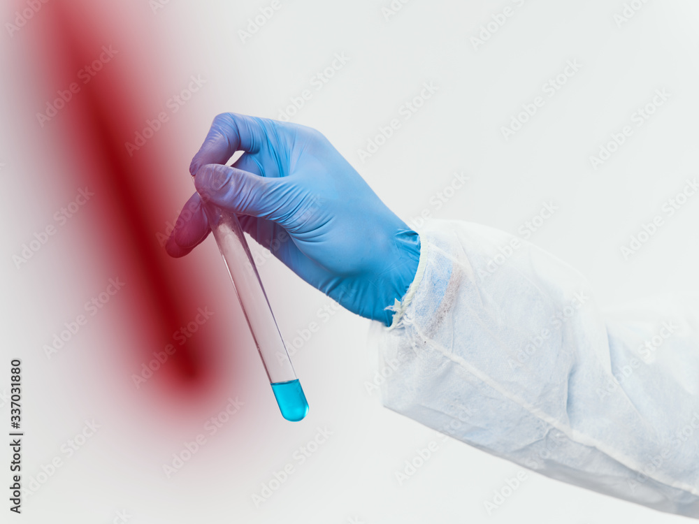 hand with a syringe hand with a syringe