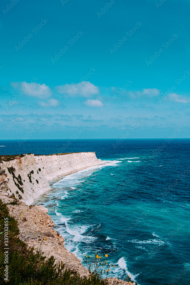 Waves hitting the rocky coast of Malta.