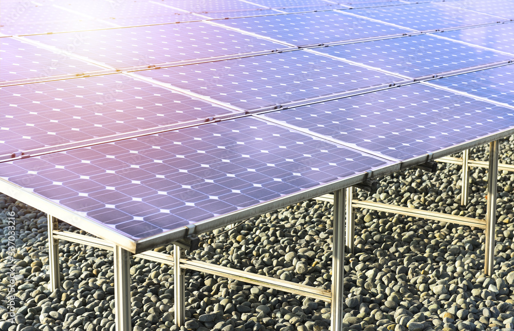 Φωτογραφία Beautiful sunset over photovoltaics in solar panels station farm ecology power conservation,Generating clean energy with renewable resources like sun for solar electric