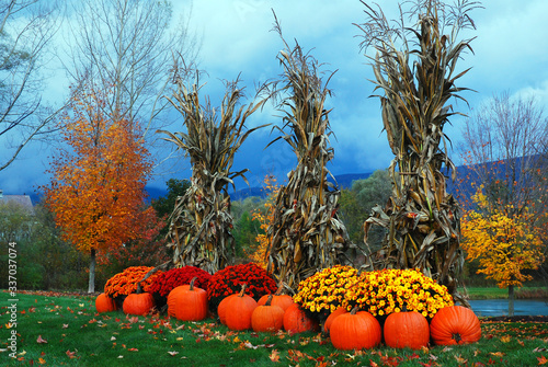 Autumn decorations sit under stormy skies in Vermont photo