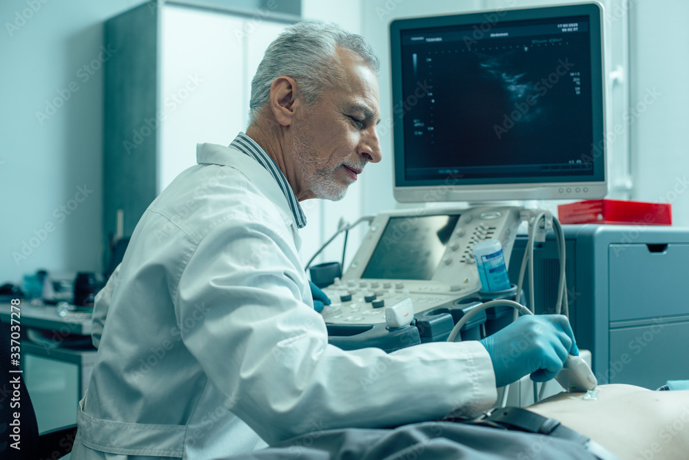 Professional ultrasound diagnostic in the clinic stock photo Professional ultrasound diagnostic in the clinic stock photo