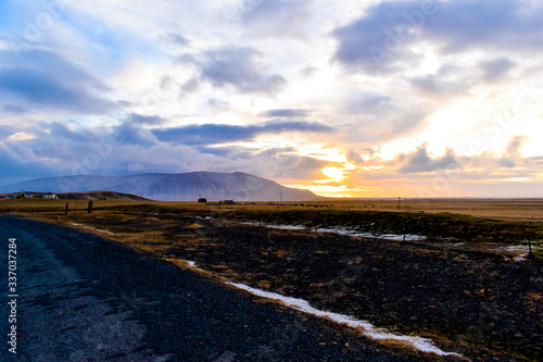 A photo of the Icelandic landscape at sunset during winter