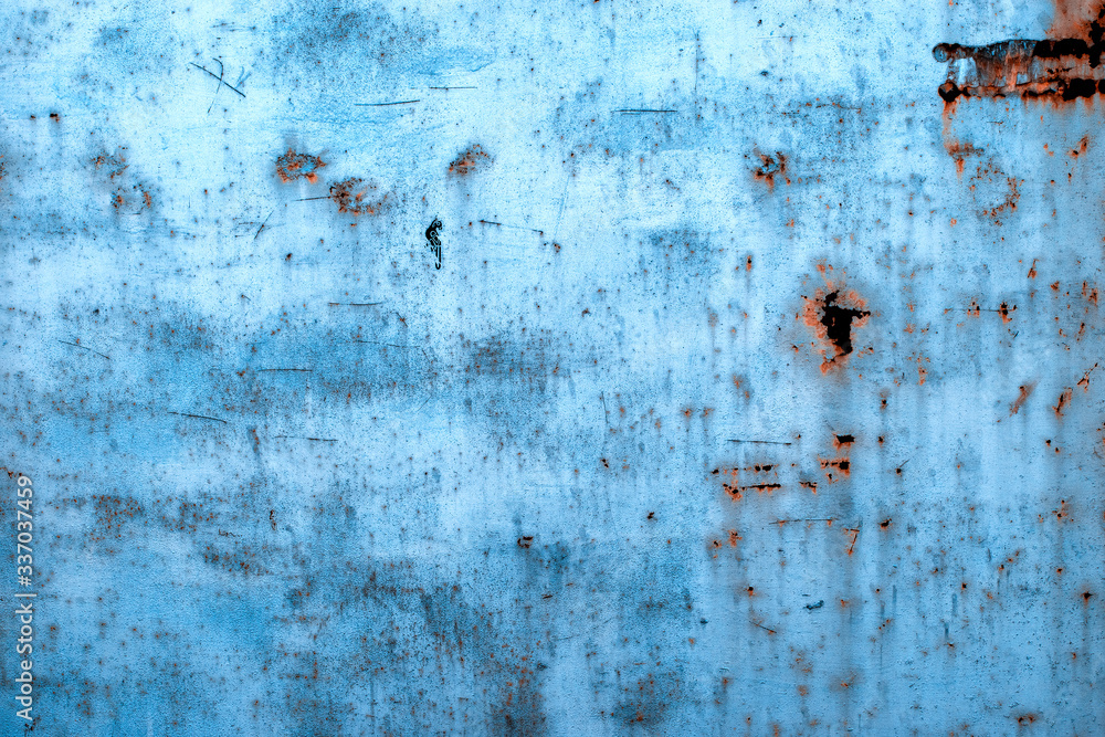Old rusty metal wall. Rusty surface in blue. Old rusty metal wall. Rusty surface in blue.